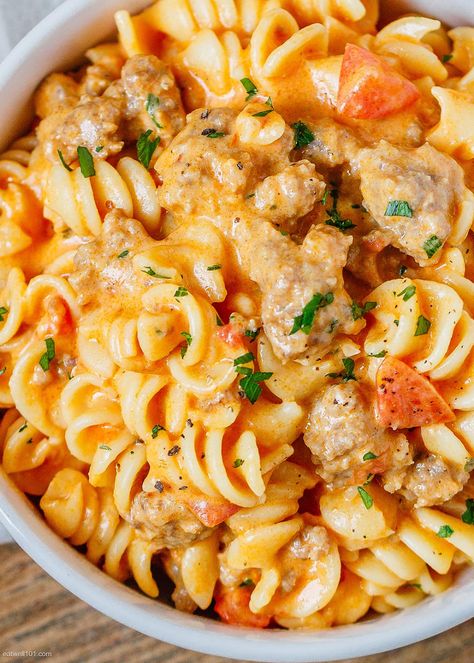 Cheesy Sausage Rotini Pasta Recipe - #sausage #pasta #recipe #eatwell101 - This cheesy sausage rotini pasta recipe is perfect for a quick and satisfying family dinner. - #recipe by #eatwell101 Rotini Sausage Pasta Recipes, Best Rotini Pasta Recipe, Sausage And Rotini Pasta, Rotini Pasta Casserole Recipes, Rotini Noodle Recipes, Healthy Rotini Pasta Recipes, Sausage Rotini Pasta Recipes, Recipes With Rotini Pasta, Sausage And Pasta Recipes Easy