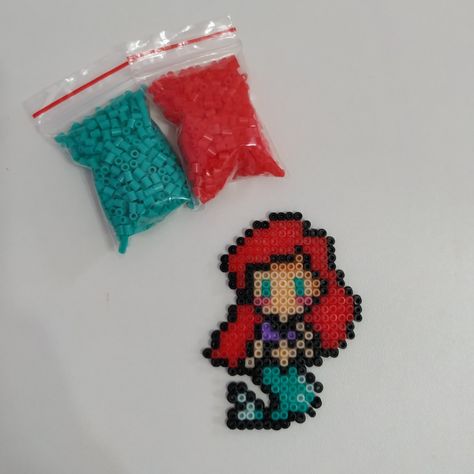 Ariel Perler Bead Pattern, Perler Bead Mermaid, Mermaid Perler Bead Pattern, Melt Beads Patterns, Modele Pixel Art, Clay Bead Necklace, Pixel Beads, Beads Patterns, Diy Perler Bead Crafts