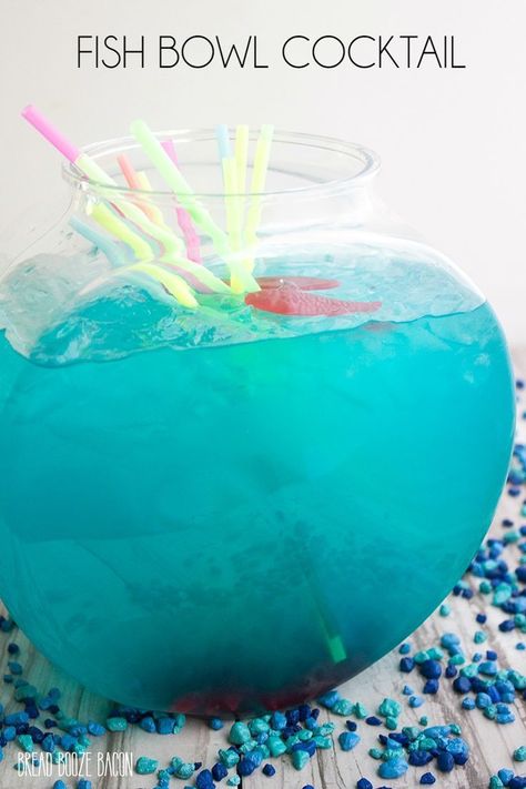 This Fish Bowl Cocktail is a fun party drink, perfect for sharing with friends! Fish Bowl Punch, Fishbowl Cocktail, Fishbowl Drink, Bowl Cocktails, Fun Party Drinks, Sharing With Friends, Bread Booze Bacon, Alcholic Drinks, Easy Drink Recipes