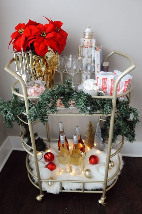 ‘Tis the season to be jolly! And I’m not just talkin’ Santa. 😉 A holiday bar cart is one of my favorite ways to add some Christmas cheer to our living + dining room. Plus, it’s great for small spaces and has functional storage! Here’s how to create your own! #holidaydecor #howto #barcart #holidayseason #holiday #homedecor #home Christmas Drink Cart Decor, Grinch Bar Carts, Christmas Party House Decor, Holiday Bar Carts, Bar Cart Holiday Decor, Christmas Wine Bar, Christmas Cocktail Station, Home Bar Christmas Decor, Valentines Bar Cart