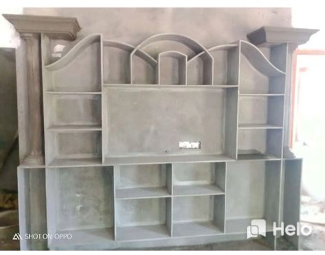 Cement Showcase Designs, Hall Self Design With Cement, Tv Wall Design Cement Work, Cement Cupboards In Hall, Cupboard Design For Hall, Wall Designs For Hall, Shelf Designs For Hall, Wall Showcase Design, Tv Shelf Design