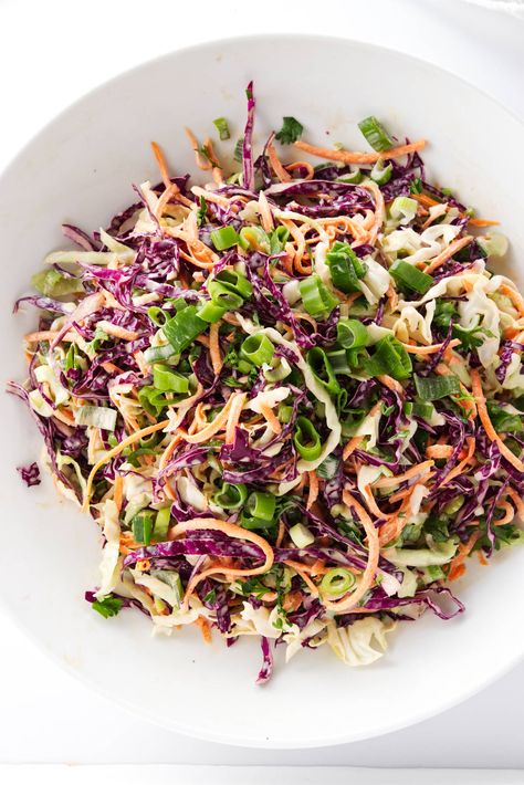 This is the Best Coleslaw for Pulled Pork. It has shredded carrots, cabbage, and green onions mixed with a creamy, tangy dressing. Best Coleslaw For Pulled Pork, Slaw For Pulled Pork, The Best Coleslaw, Pork Side Dishes, Red Cabbage Coleslaw, Coleslaw For Pulled Pork, Best Coleslaw, Bbq Pork Loin, Cabbage Coleslaw