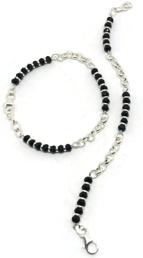 PRICES MAY VARY. Black Beads Sterling Silver (92.5% silver purity) Kids Najariya come in three -four length sizes 4.5 inch ( 0-6 month kids), 5.0 inch ( 6-12 month kids), 5.5 inch (1-2 years kids) , 6.0 inch (2+ years kid) and are made in India and Imported, price is per pair. Purity of Sterling Silver 92.5% Najariya is guaranteed Najariya / Bracelet Weight: approx. ~5.0 - 9.0 grams, Sold in Pairs only Kids Najariya(bracelets) is Ideal for New born Kids up to age of 3 years for daily use / festi Baby Jewelry Gold, Kids Gold Jewelry, Baby Bangles, Black Beaded Bracelets, Silver Bracelets For Women, Gold Pendant Jewelry, Black Beaded Jewelry, Gold Rings Fashion, Bangles Jewelry Designs