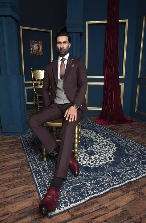 ‘Vincenzo’ - The exquisite espresso colored three piece suit with a contrasting waistcoat is incredibly versatile and full of depth that turns heads and gives you that special edge to make every occasion a special one!  #RiciMelion #FinestMenswear #Luxury #Fashion #Bespoke #Suits #Sherwani #PrinceCoat #Reception #Wedding #Groom #Bespoke #FashionPakistan #Tailoring Maroon 3 Piece Suit Men, Stylish Suits For Men Wine Color, Three Piece Suit Mens Wedding Latest, Wine Colour 3 Piece Suit For Men, Bespoke Tailored Three-piece Suit, Tailored Single-breasted Burgundy Suit, Prince Coat, Dress Suits For Men, Three Piece Suit