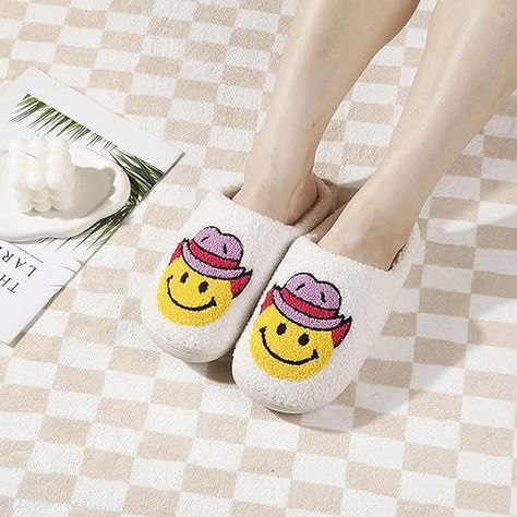 Cowgirl Smiley Face Adorable Slippers will keep your feet cute and cozy! #preppy #slippers #cowgirlslippers #cozyfeet #smileyface #smile #smileyfaceslippers #houseshoes Evil Eye Preppy, Smiley Face Cowboy, Smiley Face Slippers, Cloud Slippers, Indoor Slippers, Cute Slippers, Slippers For Women, Fuzzy Slippers, Smiley Faces