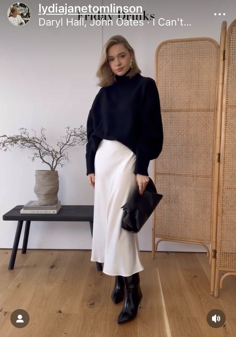 White Skirt Black Boots, Black Satin Skirt Outfit Winter, White Silk Skirt Outfit, Slip Skirt Outfit Winter, White Satin Skirt Outfit, White Skirt Winter, Satin Skirt Outfit Winter, Black Satin Skirt Outfit, Modest Winter Fashion