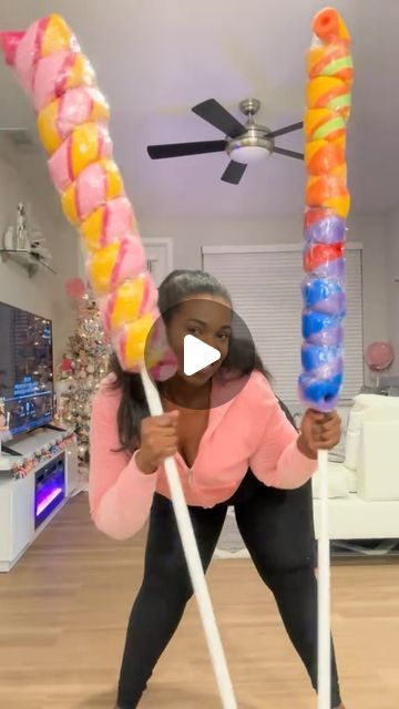 Waverly on Instagram: "Another #throwback of My giant #rainbow twist #lollipop #diy I did  last year for my #candylandchristmas ! #giantlollipop #giantcandy  #dollartreediy #candyland #giantprop #rainbowlollipop #artsandcrafts" Candyland Princess Lolly, Diy Christmas Candies Decorations, Diy Yard Candy Decorations, Candy Pool Noodles, How To Make Candyland Decorations Diy, Diy Giant Licorice Decorations, Candy Christmas Decorations Diy Outdoor, Diy Candy Kebobs, Diy Gumdrops Decorations Candy Land