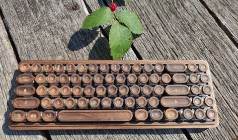 This keyboard is made for those who love the look and feel of typing on a natural wood. It's made of walnut wood, which has been naturally air-dried for 32 years. Each part is hand sanded and coated several times with an ecological oil that gives durability while maintaining the natural appearance and feel of the wood structure. #keyboard #keyboards #tech #keycaps #mechanicalkeyboard #keycap #keyboardist #logitechg #mouse #keyboardwarrior #type #ipad #woodenkeyboard #wood Wooden Keyboard, Unique Keyboards, Pc Gadgets, Keyboard Warrior, Computer Gadgets, Retro Typewriter, Retro Gadgets, Diy Cnc, Wood Structure