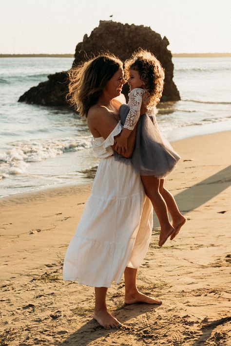 Family beach photography session at sunset in Southern California, capturing timeless moments in Orange County, San Diego, Newport Beach, and Los Angeles. Casual Beach Family Photos, Toddler Beach Photos, Family Photoshoot Beach, Mom Daughter Photography, Photoshoot At The Beach, Daughter Photography, Toddler Beach, Photoshoot Beach, Golden Moments