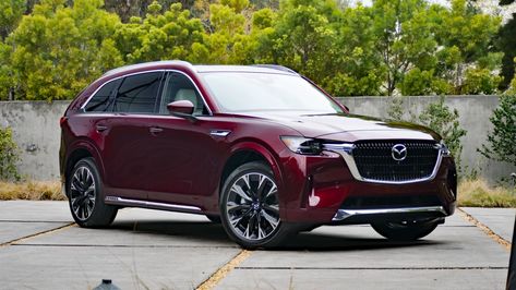 2024 Mazda CX-90 three-row SUV revealed with Mazda's new rear-drive-biased platform, plug-in hybrid powertrain and inline-six engine options. 2024 Mazda Cx90, Mazda Cx 90 2023, Mazda Cx90 2023, Mazda Cx90, Mom Cars, Mazda Suv, Mom Mobile, Luxury Cars Range Rover, Modern Cars