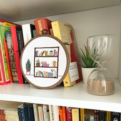 Who loves books? I love reading and I love having books in display, so to honour my bookcase, I decided to create an embroidery hoop. LEVEL: for Beginners who know already the basic embroidery stitches, but embroiderers of any level can have fun with this pattern too! PATTERN SIZE: The pattern is designed to fit a 6” hoop. WHAT IS INCLUDED? 1. Embroidery Basic Stitches: you will find step by step photos to create the basic stitches that you find in the pattern 2. Pattern and instructions Book Embroidery Pattern, Embroidery Basic Stitches, Pdf Pattern Embroidery, Book Embroidery, Basic Embroidery, Library Bookcase, Digital Embroidery Patterns, Basic Stitches, Basic Embroidery Stitches