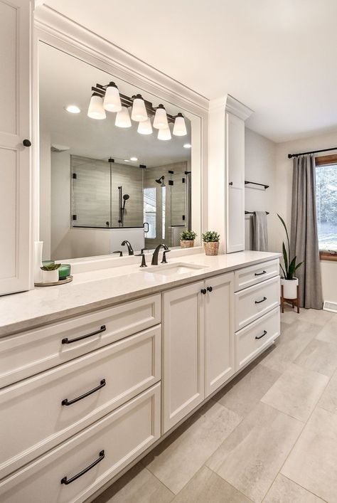 The master suite was reconfigured with a large walk-in shower. We removed a large whirlpool bathtub. The homeowners were entering their retirement years, so they wanted a walk-in curbless shower for aging in place. To add more storage, the client asked for a single sink and more cabinetry. Drawers in the vanity add valuable storage space for toiletries and bath towels. Large Single Sink Vanity Master Bath, 72 In Bathroom Vanity Ideas, Master Bath With One Sink And Vanity, Master Bath Vanity Single Sink, Single Sink Master Vanity, One Sink Large Vanity, Bathroom With Large Vanity, Large Single Vanity Bathroom, One Sink Master Bath Vanity