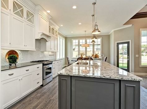 White kitchen cabinetry with grey accent island. Chrome hardware ... Gray Granite Countertops Kitchen, Rustic White Furniture, Granite Countertops With White Cabinets, Countertops With White Cabinets, White Cabinets With Granite, Grey Granite Countertops, Light Grey Kitchen Cabinets, Gray Island, Light Grey Kitchens