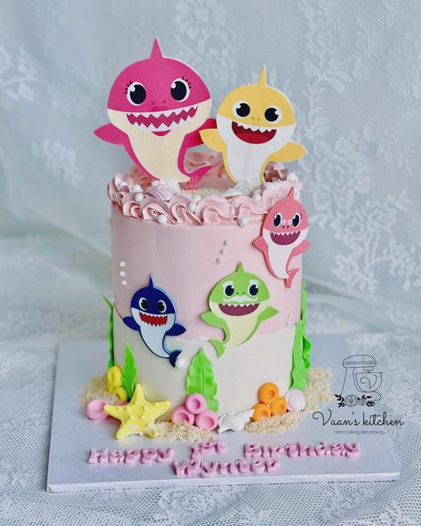 Baby Shark Cake for a little girl turning 1st #birthdaycakes #cupcakes #buttercreamcakes #fondantcakes #customcakes #handmadetopper #cakedecor #cakedesign #sydneycake #sydneycakes #vaanskitchen #spongecake #babysharkcake #babysharkcakes Baby Shark Birthday Party Girl Cake, Baby Shark Girl Birthday Party, Baby Shark Cake Pops, Baby Shark Cake Girl, Birthday Cake For Girls Kids, Baby Shark Birthday Party Girl, Shark Cake Pops, Baby Shark Cake, Fondant Cake Tutorial