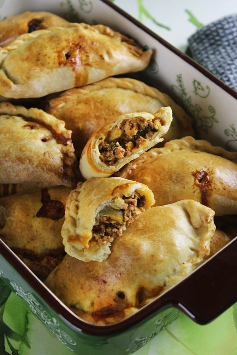 17.60 oz (1/2 kg) empanadas dough (better homemade) 17.60 oz (500 gr) ground beef 1 white onion, cut into small dices 3 cloves garlic, cut into small dices Salt, coarse, to taste 1/2 tsp ground black pepper 1 tsp cumin, ground 2 tsp dry oregano 1 tsp paprika, spicy 4 tbsp (2.11 oz) (60 gr) tomato sauce 1 tsp (0.17 fl oz) (5 ml) white vinegar 3 hard boiled egg, cut into dices 1/4 C pitted green olives Olive oil, needed amount 1 eggs, beaten, to brush the empanadas befores baking Chocolate Chip Mug Cake, Empanadas Dough, Grill Cheese Sandwich Recipes, Coconut Muffins, Cheese Sandwich Recipes, Beef Empanadas, Cream Cheese Muffins, Single Serving Recipes, Empanadas Recipe