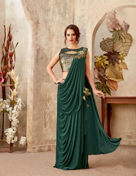 Simplicity is the best option ever when you believe in elegance. A #Lycra fabric of fine quality #Party #Wear #Saree can work like a magic to steal the functions at once. It will be an easy factor for you to get a matchless party look from our latest collections.  #BeautifulSaree #EthnicWear #LadiesWear #women_Saree #LycraSaree #indianwear #fashion #shopping #saree #DesignerSaree #CowlSaree Party Wear Sarees Online, Saree Gown, Saree Designs Party Wear, Party Wear Saree, Ready To Wear Saree, Indian Gowns Dresses, Indian Gowns, Designer Party Wear Dresses, Party Wear Indian Dresses