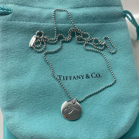 Tiffany&Co Sterling Silver Letter T On A Disc Necklace With An 18inch Beaded Chain. Brand New. Sold With Pouch, Box And Ribbon. Tiffany And Co Initial Necklace, Tiffany Initial Necklace, Tiffany Silver Necklace, Cartouche Necklace, The Letter T, Suede Bracelet, Open Heart Ring, Tiffany T, Platinum Chain