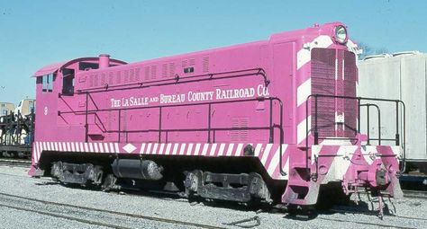 The LaSalle and Bureau County Railroad Company operated 15 miles of track in north central Illinois.  The "Bee" (as it was called locally) was founded in 1892 to provide a connection for the zinc mines of LaSalle, IL to the neighboring railroads. Unusual locomotive color scheme. Pink Seat Covers, Pink Train, Pink Wheels, Pink Cars, Pink Truck, Dog Car Seat, Central Illinois, Go Pink, Pink Life