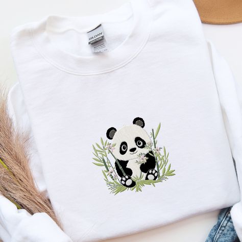 𝑬𝒎𝒃𝒓𝒐𝒊𝒅𝒆𝒓𝒆𝒅 𝑷𝒂𝒏𝒅𝒂 𝒔𝒘𝒆𝒂𝒕𝒔𝒉𝒊𝒓𝒕 🐼 🐼 This adorable and whimsical panda Sweatshirt is a great addition to your all season wardrobe, especially in spring! 🌼 It's prefect for taking a walk, running errands, chilling at home, or hanging out with friends! Our crewnecks are made from the highest quality fabric for an incredibly soft and comfortable fit. You can find the sweater in my Etsy Shop 🤍 👉🏻 link in Bio #embroiderydesigns #embroideredart #embroidery #sweatshirtforwomen #embroidered #embroider... Panda Sweater, Chilling At Home, Hanging Out With Friends, Panda Shirt, Kawaii Panda, Out With Friends, Taking A Walk, White Shirt Men, Embroidered Art