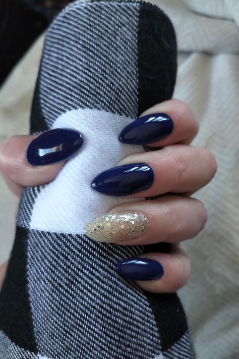 Navy with gold sparkle nail nailart nails beauty Navy Color Nails, Navy And Gold Acrylic Nails, Nails For A Navy Dress, Navy And Gold Nails Acrylic, Dark Blue Pearl Nails, Navy Blue Nails Almond Shape, Gold And Dark Blue Nails, Blue And Gold Sparkle Nails, Midnight Blue Prom Nails