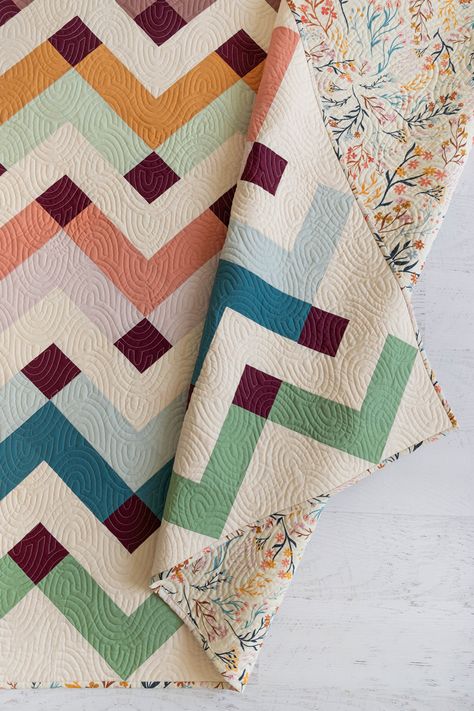 Ready to Elevate Your Quilting Game? Explore this stunning beginner-friendly Thrive Quilt by Suzy Quilts, showcasing fabrics from Signature PURE Solids. With various sizes available, it's the perfect way to level up your quilting skills. Find this quilt pattern and more sewing inspiration in our Lookbook! Let's start stitching. #ArtGalleryFabrics #QuiltsAesthetic QuiltBlocksEasy #CozyQuilts #QuiltDesigns #ModernQuilting #PatchworkQuilting #SewingInspiration #PatchworkQuilts Solid Color Quilts, Easy Quilt Patterns For Beginners, Suzy Quilts, Patchwork Inspiration, Diy Fabric Crafts, Solid Quilt, Signature Quilts, Cozy Quilts, Warm Fuzzies