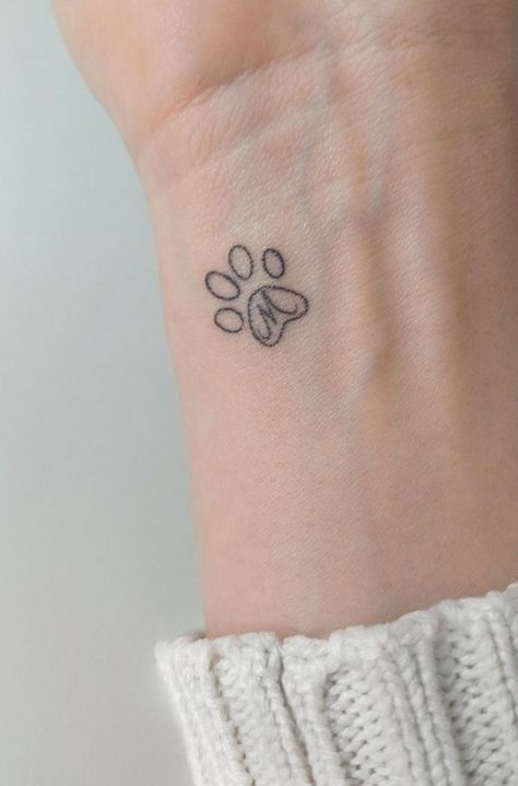 Minimal Hidden Tattoos, Special Dog Tattoo, Line Work Paw Print Tattoo, Remember Dog Tattoo, Small Meaningful Dog Tattoos, Dog Remembrance Tattoos, Doggie Tattoos Ideas, Tattoos For Lost Dogs, Paw Print Tattoo With Initial