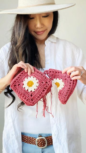 Stephanie Lau @AllAboutAmi on Instagram: "Wondering how many daisy granny squares and triangles you’ll need to make a tank top? 🌼 12 squares + 4 triangles = 1 tank top! You can also adjust the length of the tank top by adding 4 more squares (longer) or taking away 4 squares (shorter for a crop top)! I love piecing these shapes together and seeing a garment come to life 😍 Pattern available on my blog & Etsy shop (links in bio), and there is a kit available too! How many squares and triangles have you crocheted for your tank top? 🩷 #breezydaysdaisytanktop #crochettanktop #crochettop #grannysquaretank" Fitted Crochet Top With Granny Square For Spring, Crochet Square Tank Top, Spring Beach Tops With Granny Square Details, Granny Square Sleeveless Summer Top, Daisy Crochet Top, Crochet Daisy Granny Square Top, Crochet Tank Tops, Granny Squares, Triangles