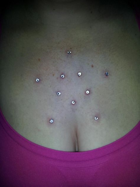 My piercing 10 dermals on my chest in the shape of a star!!! LOVE THEM Dermal Piercing Ideas, Dermal Piercing Chest, Chest Dermal, Back Dermal Piercing, Finger Dermal, Metal Tattoos, Dermal Piercings, Microdermal Piercing, Skin Tags