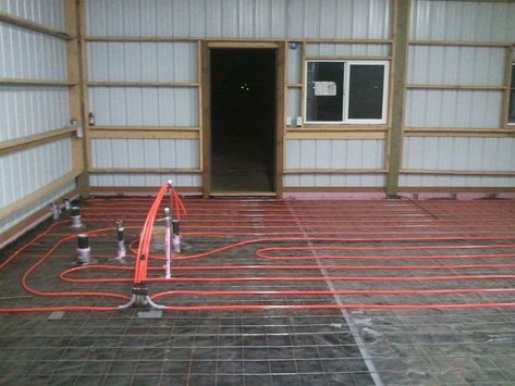 Radiant Floor Heating Concrete, Radiant Heat Flooring, Barndominium Flooring, House Built Into Hillside, Hydronic Radiant Floor Heating, Heated Concrete Floor, Industrial Decorating, Garage Build, Radiant Heating System