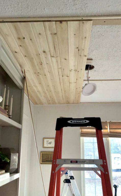 Cedar Planks Over Popcorn Ceiling PT1 - Made by Carli Planking Ceiling Diy, Ceiling Farmhouse Ideas, Gambrel Ceiling Ideas, Wood Plank Basement Ceiling, Ceiling Shiplap Diy, Redo Ceiling Ideas, Finishing Basement Ceiling, Ceiling Renovation Ideas, Beadboard Wall And Ceiling