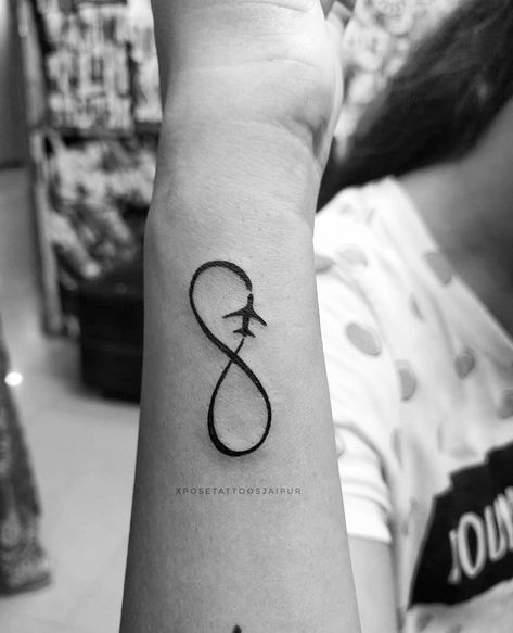 The biggest adventure you can take is to live the life of your dreams. Infinity with plane tattoo done at xposetattoosjaipur . . for more info, Contact📞: +917568000888 Website: http://xposetattoos.com Address: 3rd floor, Crystal Palm Mall, 22 Godam Circle, Jaipur Facebook👥: www.facebook.com/XposeTattoosJaipur Snapchat👻: phoenix_xpose 📧mail: xpose.tattoos@gmail.com #tattooinjaipur #tattoopriceinjaipur #besttattoopriceinjaipur #tattooshopinjaipur #tattoostudioinjaipur #besttattooshopinjaipur Plane Infinity Tattoo, Infinity Travel Tattoo, Infinity Plane Tattoo, Infinity Tattoo With Plane, Just Go Tattoo, Heart Tattoo With Plane, Infinity Airplane Tattoo, Plane Tattoo Design, Infinity Tattoo With Airplane