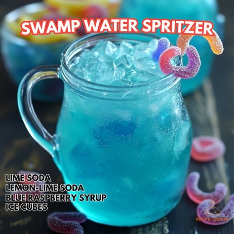 💧👻 Quench your thirst with the Swamp Water Spritzer! This spooky drink will bring a chilling touch to your Halloween party! #SwampWaterSpritzer Swamp Water Spritzer Ingredients: Lime soda (2 cups) Lemon-lime soda (1 cup) Blue raspberry syrup (¼ cup) Ice cubes (for serving) Gummy worms (for garnish) Instructions: In a large pitcher, combine lime soda and lemon-lime soda. Slowly add blue raspberry syrup and stir gently. Serve over ice and garnish with gummy worms. 💧👻 Sip on this Swamp Water... Blue Raspberry Syrup, Ice Cube Recipe, Swamp Water, Lemon Lime Soda, Raspberry Syrup, Gummy Worms, Lime Soda, Blue Raspberry, Ice Cubes