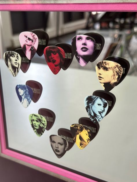 🎤 Calling all Swifties! Check out these Taylor Swift Eras Tour guitar picks we recently framed using a glitter frame, museum glass, three acid-free mats (one suede) and a mirrored background so the picks can be seen from both sides! For sale now! #art #denver #colorado #pictureframing #customframing #5280customframing #taylorswift #erastour #swifties Taylor Swift Guitar Pick, Eras Tour Guitar, Taylor Swift Guitar, Glitter Frame, Taylor Swift Eras Tour, Taylor Swift Eras, Framing Photography, Guitar Picks, I Love Bts