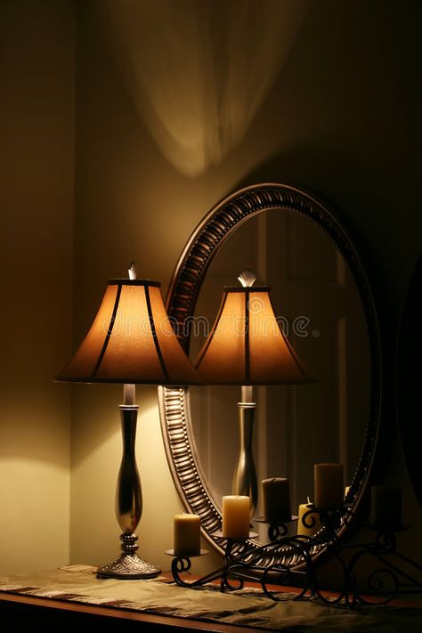 Elegant Lamp and Mirror on Table. A cozy interior still life with lamp, candles , #Ad, #Table, #cozy, #Mirror, #Elegant, #Lamp #ad Mirror Still Life, Mirror On Table, Cozy Mirror, Interior Still Life, High Art, Cozy Interior, Stock Photography Free, Mirror Image, Still Life Photography