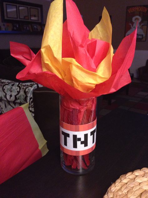 Easy to make minecraft TNT centerpieces with red licorice, red and yellow tissue, and vases from dollar tree! Minecraft Centerpiece Ideas, Minecraft Centerpiece, Minecraft Party Food, Minecraft Tnt, Minecraft Bday, Mind Craft, Minecraft Party Decorations, Minecraft Birthday Cake, Minecraft Theme