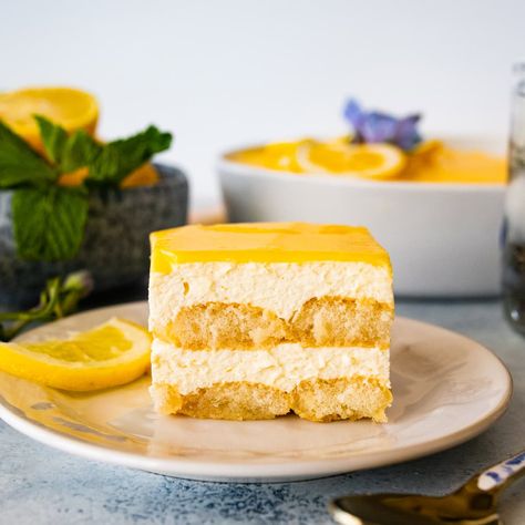 Easy Lemon Tiramisu Recipe with Lemon Curd (Italian) Lemon Trimasu, Lemon Tiramisu Taste Of Home, Lemon Teramasoo, Decadent Dessert Recipes, Calamansi Dessert, Lemon Tiramisu With Lemon Curd, Italian Dessert Recipes Easy, Lemon Tiramisu Recipe, Amaretto Tiramisu