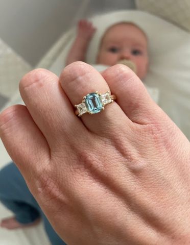 She was wanting to create a ring that represented "her boys" (her husband and her two sons). Before the conversation, we had sourced a gorgeous cushion cut aquamarine with big plans in mind. But once Patterson laid her eyes on it, those plans changed. She needed it! So of course, we used it, and the aquamarine became the center stone in her custom ring.