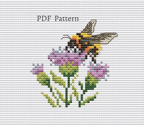 Cross Stitch Bee Pattern, Bee Cross Stitch Pattern Free, Thistle Cross Stitch Pattern, Spring Cross Stitch Patterns, Cross Stitch Plants, Cross Stitch Bee, Insect Cross Stitch, Bee Cross Stitch Pattern, Cross Stitch Easter