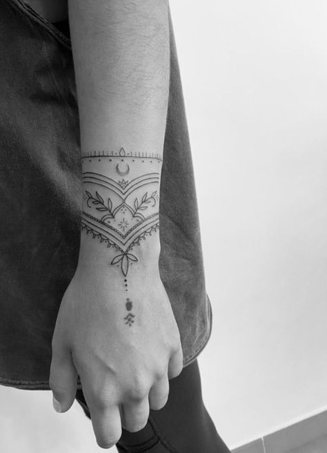 Minimalist Arm Band Tattoo Women, Paisley Wrist Tattoo, Cuff Wrist Tattoo, Women's Wrist Tattoos, Upper Wrist Tattoos For Women, Ornamental Bracelet Tattoo, Wrist Mandala Tattoos For Women, Outside Wrist Tattoo, Wrist Band Tattoo For Women