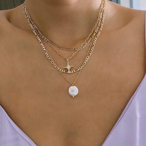 Our Figaro chain necklace is high up on the list of pieces that many would deem as a ‘classic’ silhouette. It’s one of those necklaces that will never go out of style. She strikes the perfect balance of capturing that feminine and sexy essence but also has a touch of toughness that makes it feel modern yet cool 🤍 #14kgold #finejewelry #aestheticjewelry Figaro Chain Necklace, Figaro Chains, Figaro Chain, Classic Silhouette, Go Out, Out Of Style, The List, Going Out, Chain Necklace