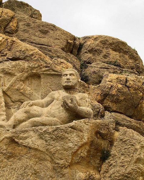 Statue of Hercules is located in Mount Behistun and was discovered around 1957. It was built in 153 BC during the time of the Seleucid Empire or the Parthian Empire. Hercules is lying on a 2 m long platform and holds a bowl in his left hand. He has put his right hand on his foot. The statue is 1.47 m long and is attached to the mountain. #ttp #tourtopersia #tourtoiran #ttp #tourtopersia #tourtoiran#architecture #travel #h info@tourtopersia www.tourtopersia.com Seleucid Empire, Parthian Empire, Zagros Mountains, Chinese Warrior, Pagan Gods, Iran Travel, Ancient Statues, Ancient Mesopotamia, Ancient Technology