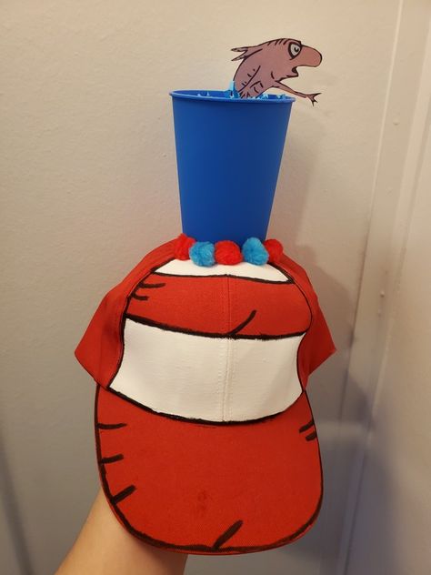 Easy DIY Cat in the Hat inspired hat for Dr. Seuss week for daughter school. Cat In The Hat Tail Diy, Dr Suess Cat In The Hat, Cat In The Hat Day At School Outfit, Cat In The Hat Headband Diy, Dr Suess Crazy Hat Ideas, Diy Cat In The Hat Hat, Cat And The Hat Crafts, Dr Seuss Crazy Hat Day Ideas, Diy Dr Seuss Hat