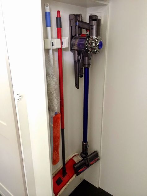 brooms, dusters & dyson storage Dyson In Closet, Dyson Storage Cupboard, Rangement Dyson, Cordless Vacuum Storage Ideas, Vaccume Storage Ideas, Dyson Organization, Dyson Storage Ideas, Dyson Vacuum Storage, Dyson Vacuum Storage Ideas