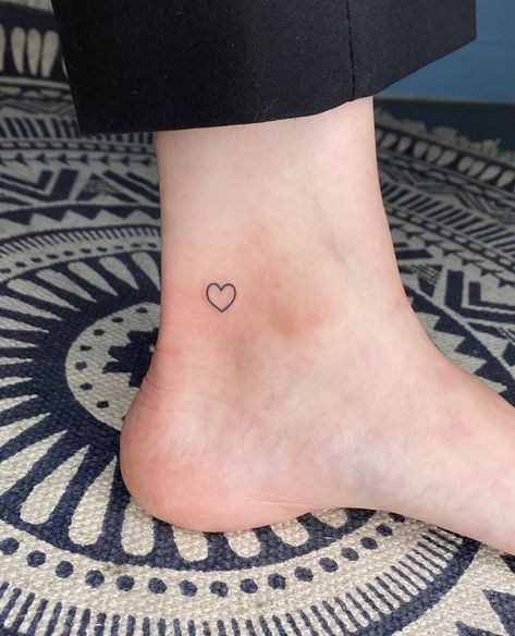 Tiny Heart Tattoo On Ankle, Delicate Small Tattoos, Small Heart Tattoo Placement Ideas, Small Feet Tattoos For Women Simple, Heart On Ankle Tattoo, Heart Foot Tattoo, Tiny Ankle Tattoos For Women, Heart Tattoo Women, Secret Tattoo Ideas