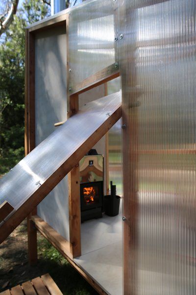 Photo 4 of 12 in This Translucent, Prefab Sauna Is the Perfect Backyard Addition - Dwell Sauna Wood Stove, Prefab Buildings, Modern Doors, Outdoor Sauna, Perfect Backyard, Cubby Houses, Outdoor Bathrooms, Garden Studio, Modern Door