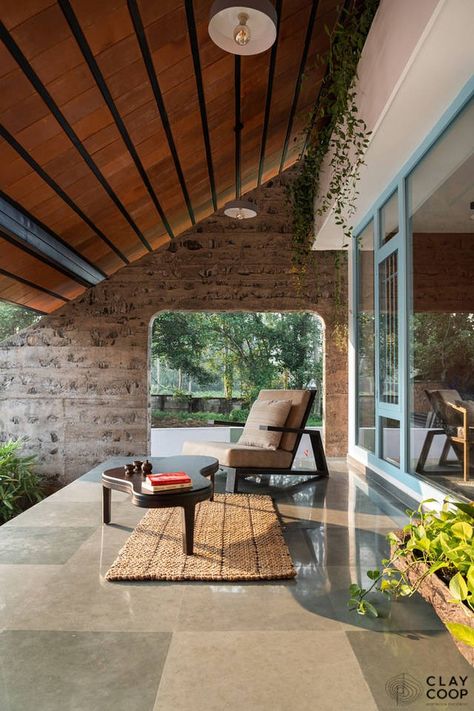 Inara House | CLAY COOP Architects - The Architects Diary Kerala Architecture, Sloping Roof, Winter Lights, Kerala House Design, Kerala Houses, Architecture Model House, Village House Design, Tropical Houses, Village Houses