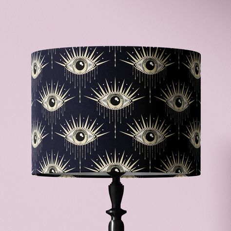 Diameter: 30cm Height: 21cm Type: Table Lamp Shade Bulbs: B22, E14, E27, E26 - adaptor included Made to order, please allow up to two weeks for delivery. Print placement may vary slightly from the sample image.  Enhance your home décor with our Whimsigoth Evil Eye Lamp Shade, a perfect fusion of mystical charm and luxurious elegance. This lampshade, handcrafted from premium velvet, combines whimsical fantasy with gothic allure. The deep, rich texture adds a touch of opulence, making it an eye-ca Witchy Hallway, Boho Gothic Decor, Whimsigoth Diy, Whimsigoth House, Whimsical Gothic Decor, Electric Decor, Minimalist Whimsigoth, Witchy House Decor, Witchy Office