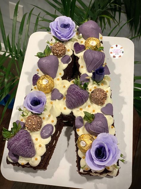 Chocolate cake, purple themed #ferrerorocher #chocolatecoveredstrawberries Letter A Cake Birthday, Purple Number Cake Ideas, Purple Number Cake, Letter A Cake, Purple Letter Cake, Number Cake Chocolate, Number Cake Chocolate Decoration, Pink And Purple Number Cake, Chocolate Cake With Purple Decorations