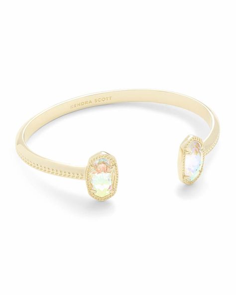 A dainty pinch cuff bookended with our signature oval stones, the Elton Gold Cuff Bracelet in Dichroic Glass is a stack staple. This beautifully designed gold cuff bracelet is guaranteed to turn heads every time you wear it. No matter the size of your wrist, our Elton Cuff Bracelet is sure to fit you and your style. Texas Necklace, Rose Gold Cuff Bracelet, Kendra Scott Bracelet, Dichroic Glass Jewelry, Gold Cuff Bracelet, Arm Party, Gold Bracelet Cuff, Jewelry Essentials, Gold Cuffs