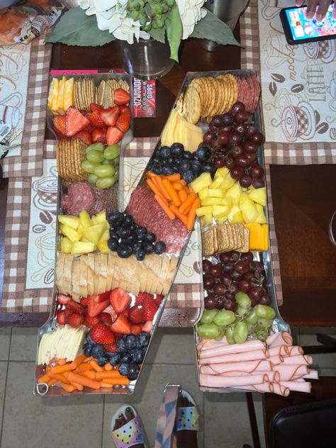 A display of meats, cheeses, fruits and veggies Charcuterie Letter Board, Fruits And Veggies, Charcuterie Board, Cheese Board, Letter Board, Dairy, Bridal Shower, Cheese, Meat